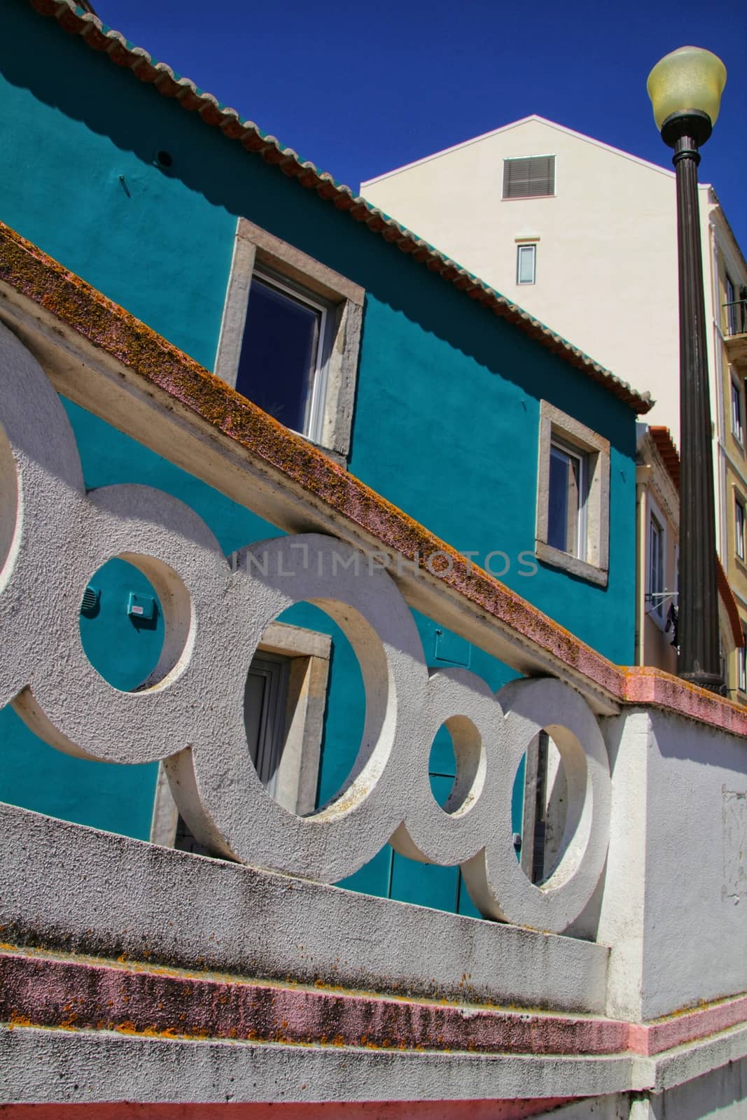 Narrow and colorful streets, majestic facades, windows and balconies of Lisbon, Portugal