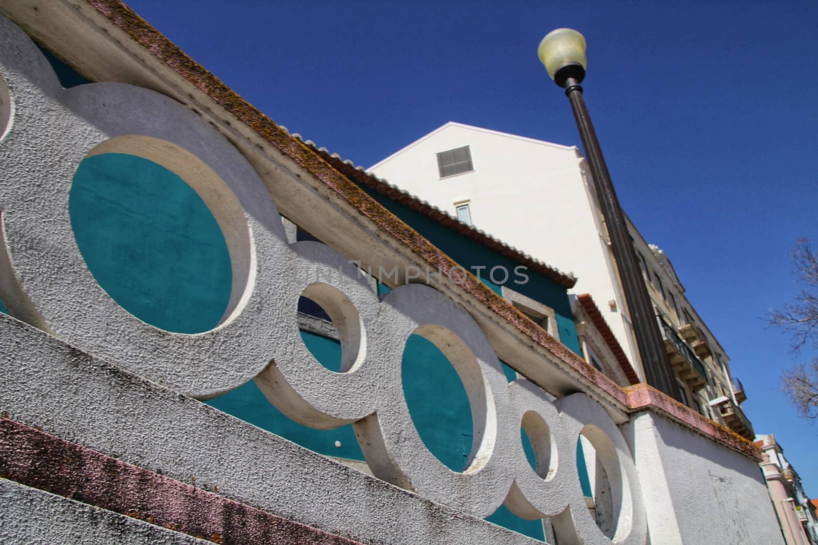 Narrow and colorful streets, majestic facades, windows and balconies of Lisbon, Portugal