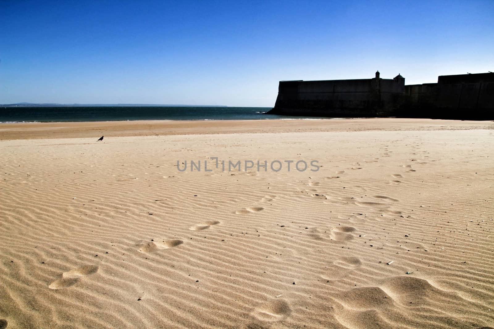 Beautiful beach called Praia da Torre in Lisbon, Portugal, in a sunny day of Spring