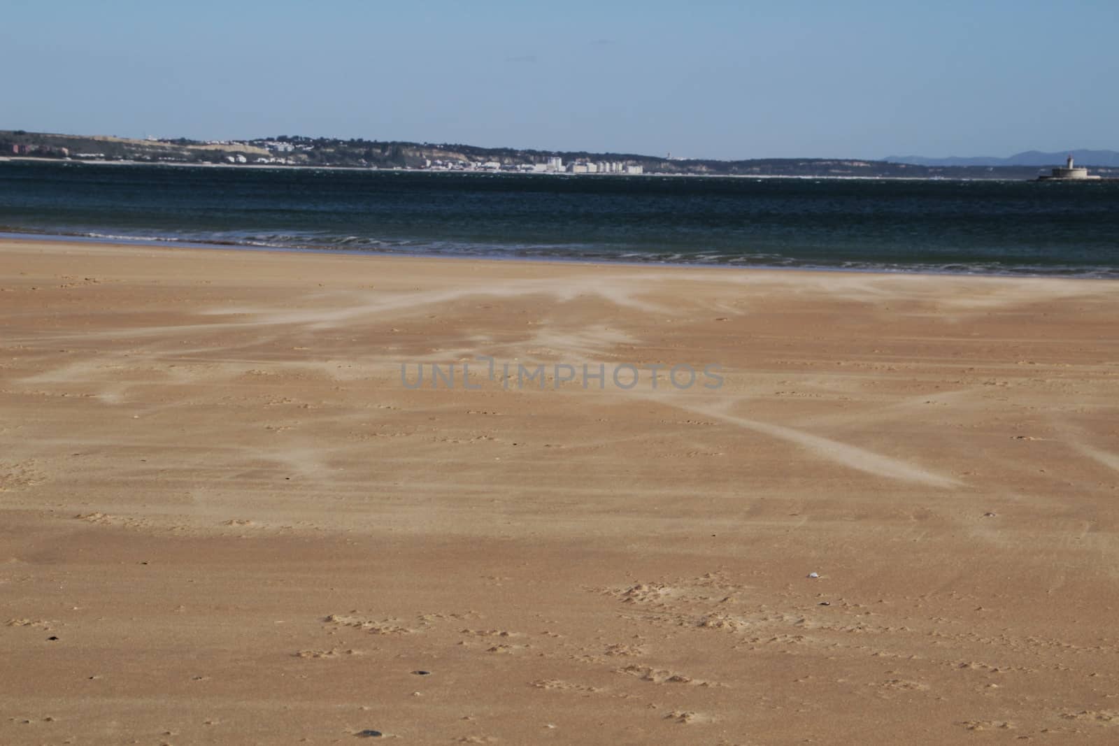 Beautiful beach called Praia da Torre in Lisbon, Portugal, in a sunny day of Spring