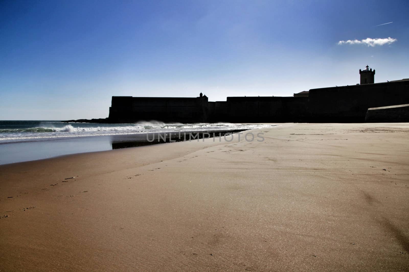 Beautiful beach called Praia da Torre in Lisbon, Portugal, in a sunny day of Spring