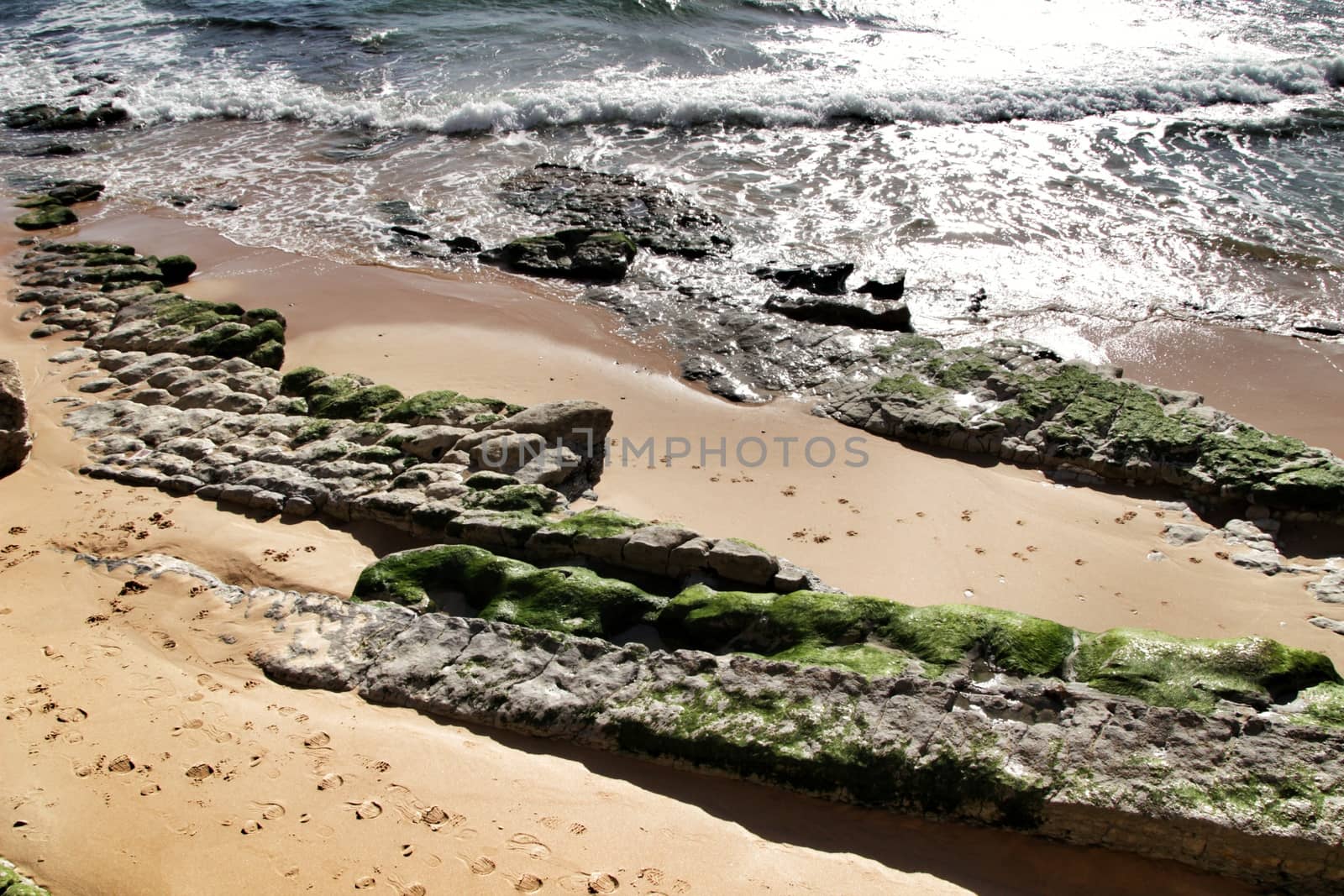 Beautiful Azarujinha beach with rock formations in Estoril, Lisbon, Portugal, in a sunny day of winter