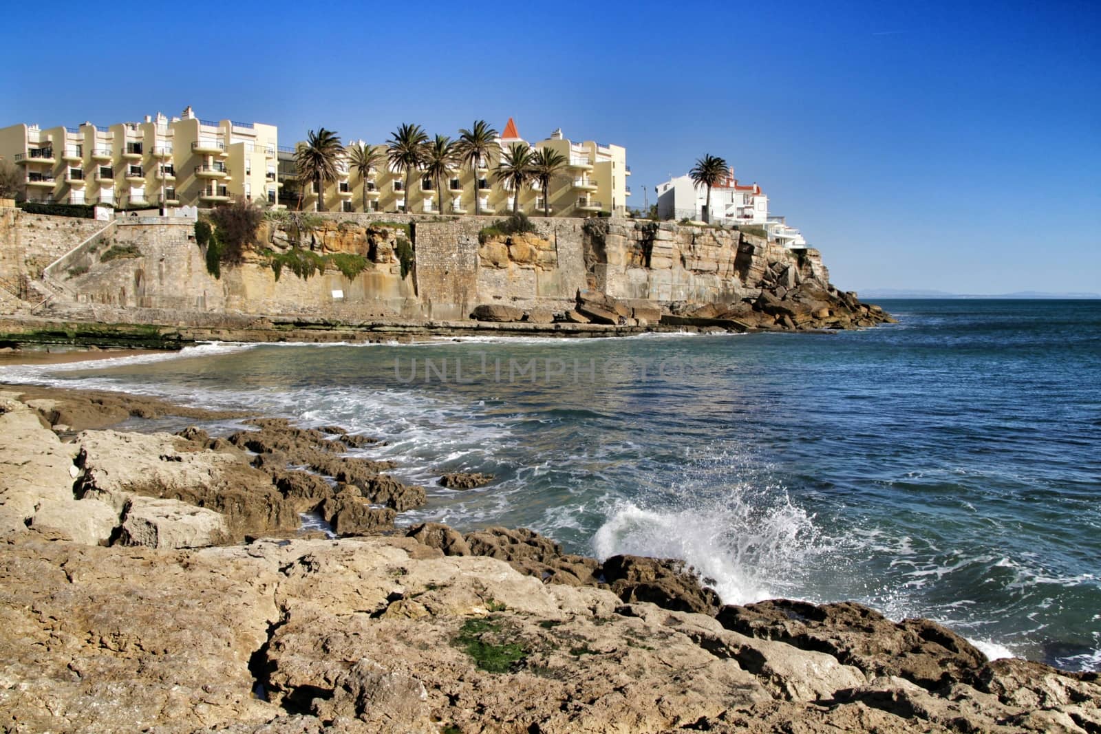 Beautiful Azarujinha beach with rock formations in Estoril, Lisbon, Portugal, in a sunny day of winter