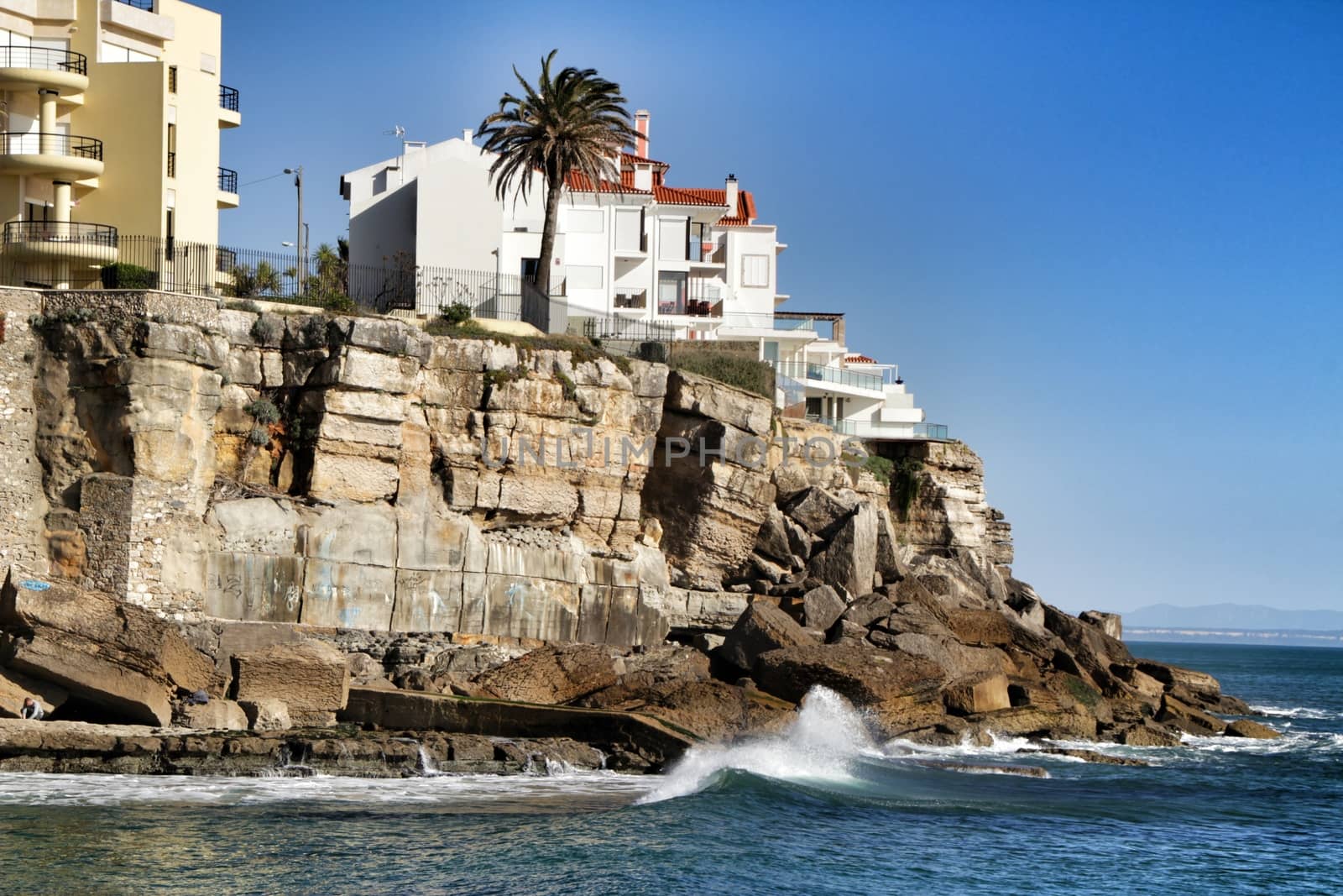 Beautiful Azarujinha beach with rock formations in Estoril, Lisbon, Portugal, in a sunny day of winter