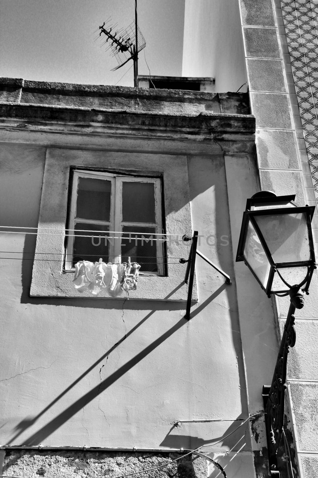 Old and typical facade in the street of Lisbon