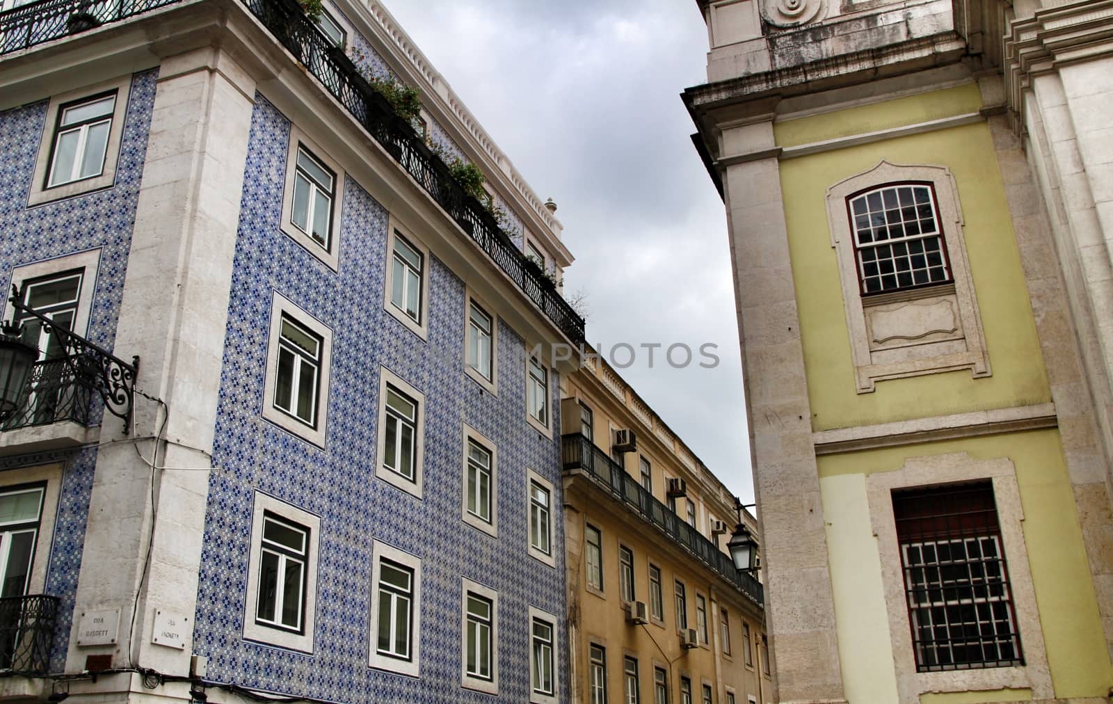 Narrow and colorful streets, majestic facades, windows and balconies of Lisbon, Portugal