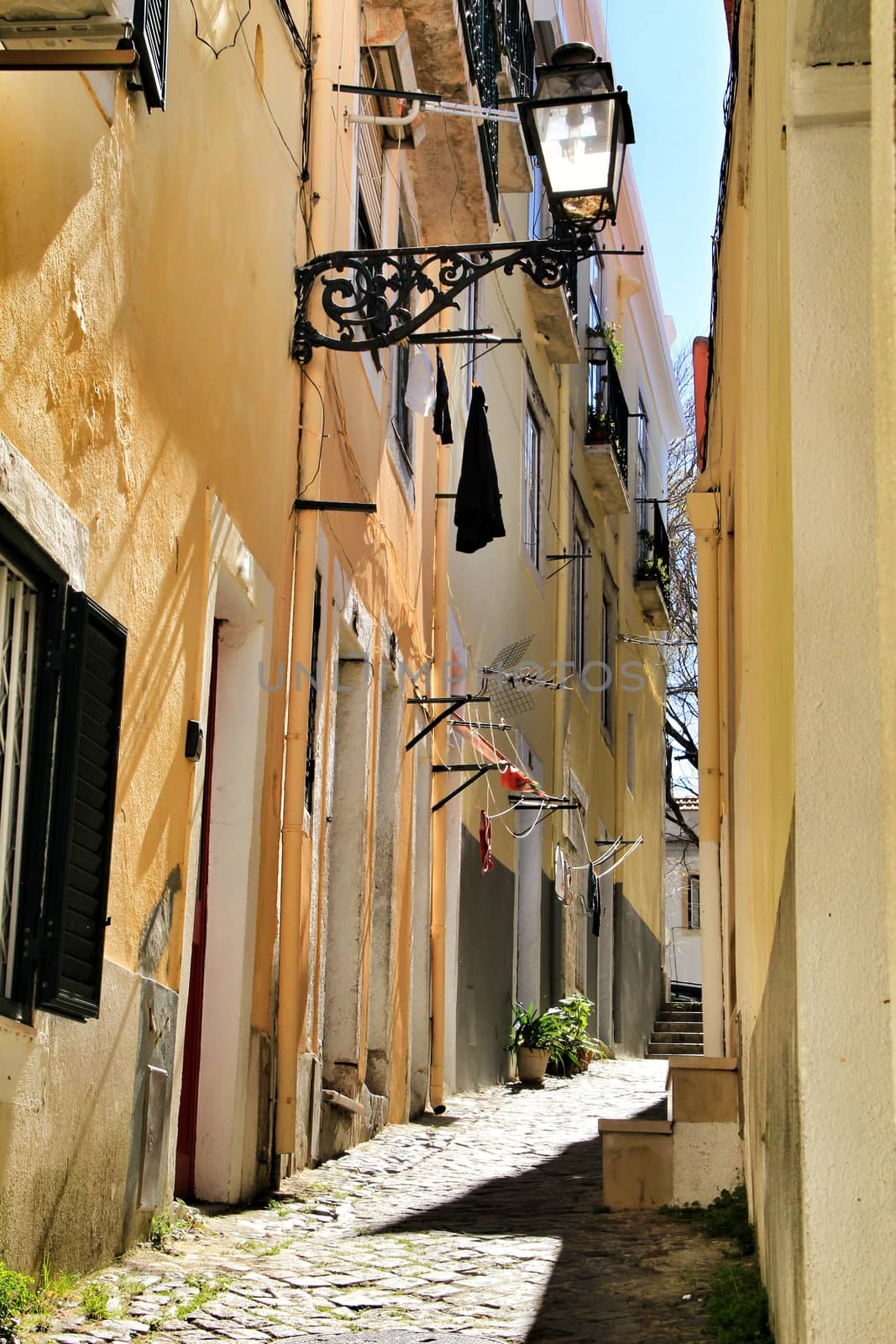 Old colorful houses and narrow streets of Lisbon, Portugal in Spring.