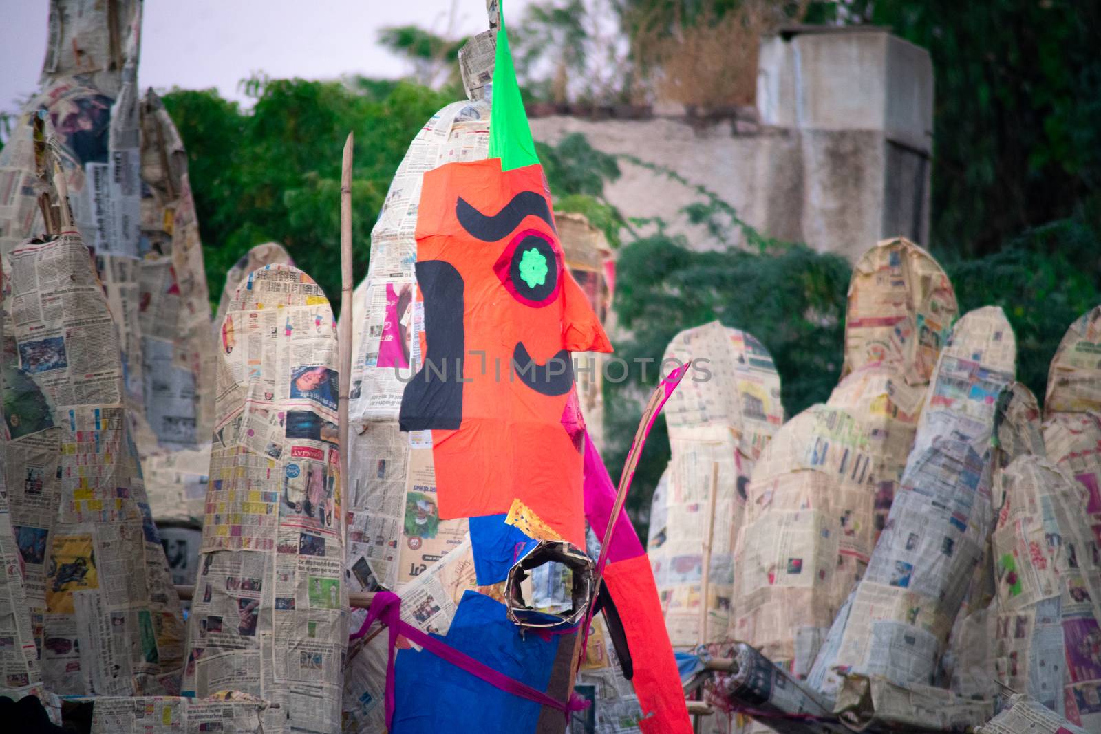 shot on multiple paper effigy statues of ravan the demon king who is burnt on the hindu festival of dussera as foretold in the ramayana by Shalinimathur