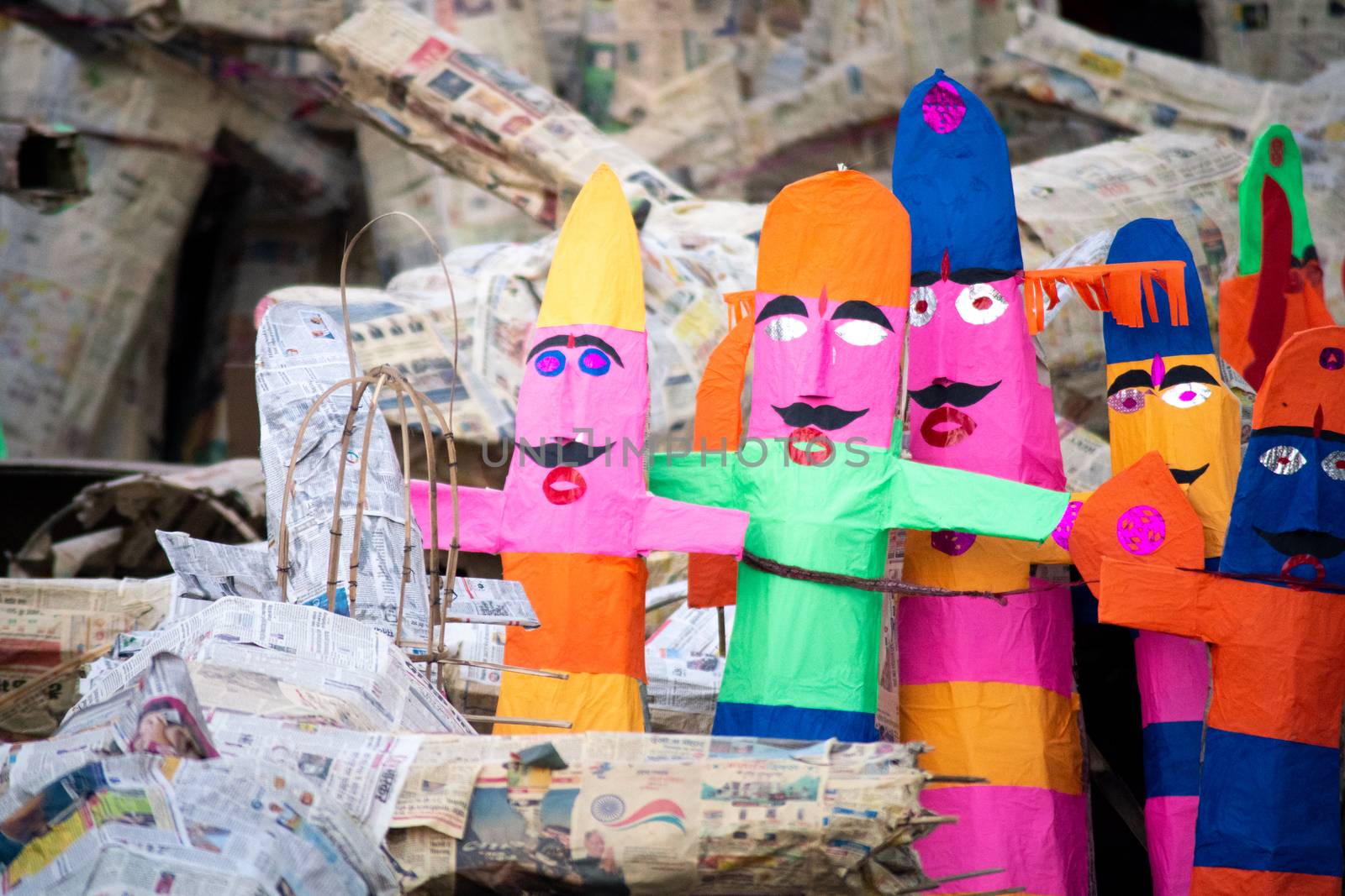 shot on multiple paper effigy statues of ravan the demon king who is burnt on the hindu festival of dussera as foretold in the ramayana by Shalinimathur