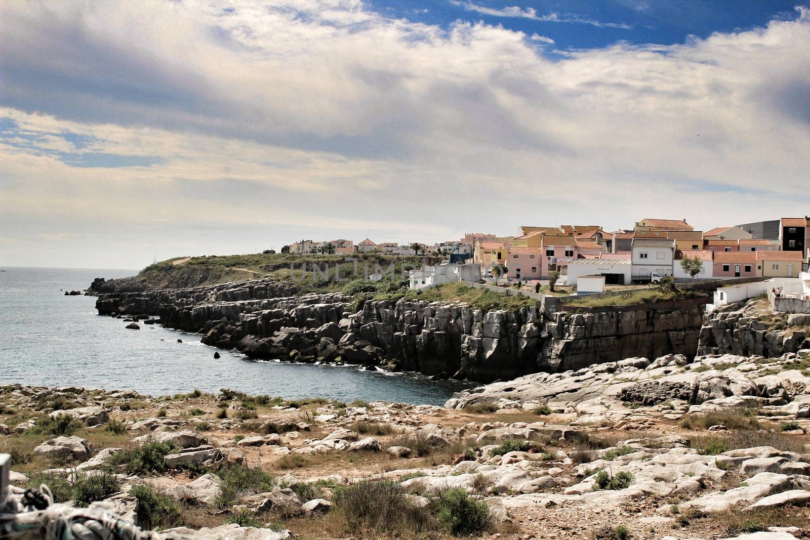 Views of the Peniche village and wild Atlantic Ocean with beautiful cliffs and beaches in Portugal