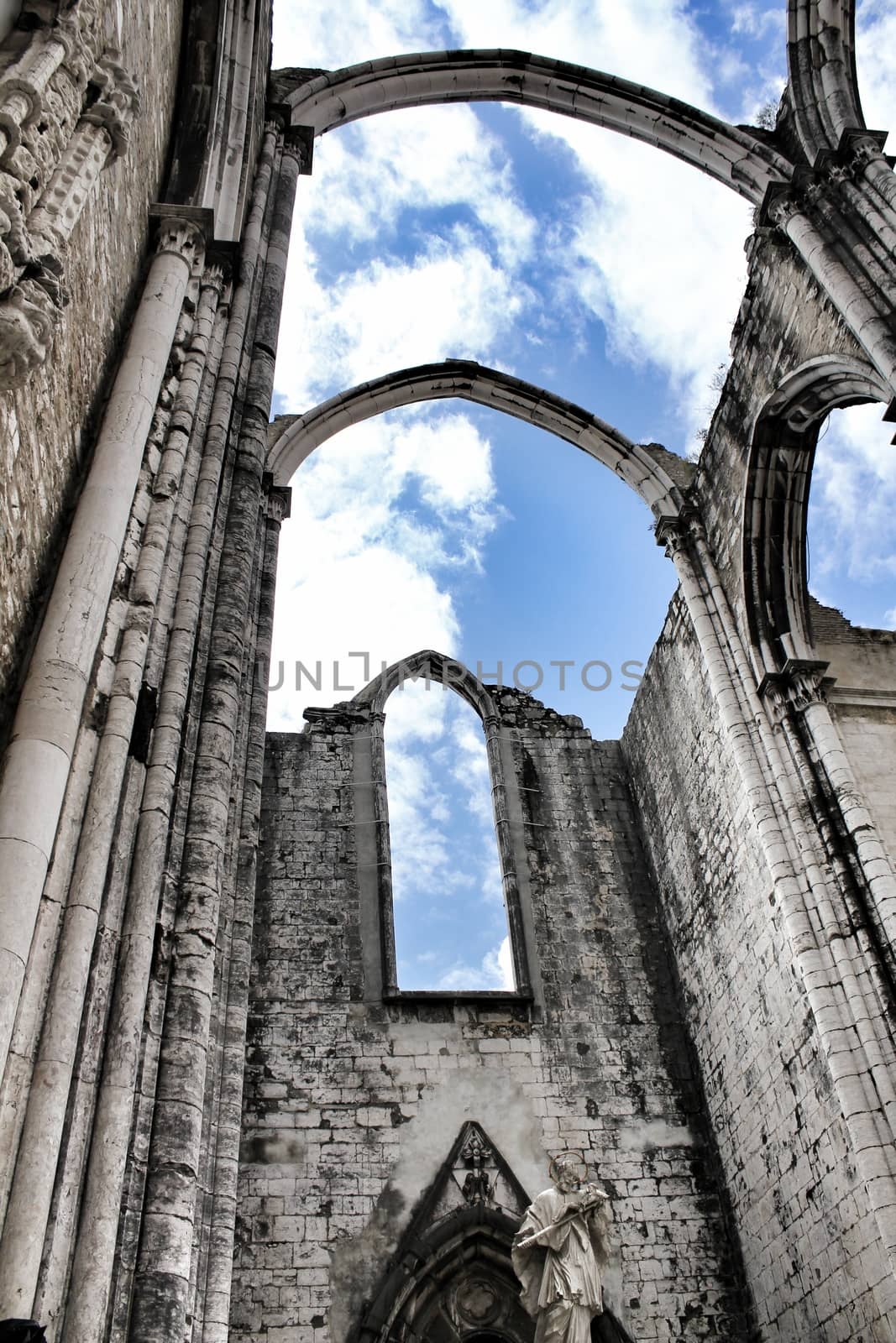 Arcades, pillars and facade of Do Carmo convent in Lisbon, Portugal