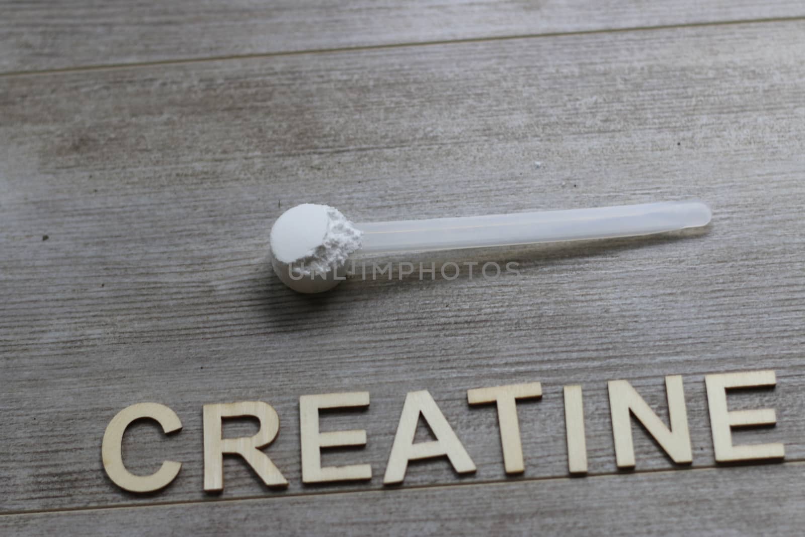 creatine themed images with lots of room for copy space. sports, workout and fitness theme. High quality photo