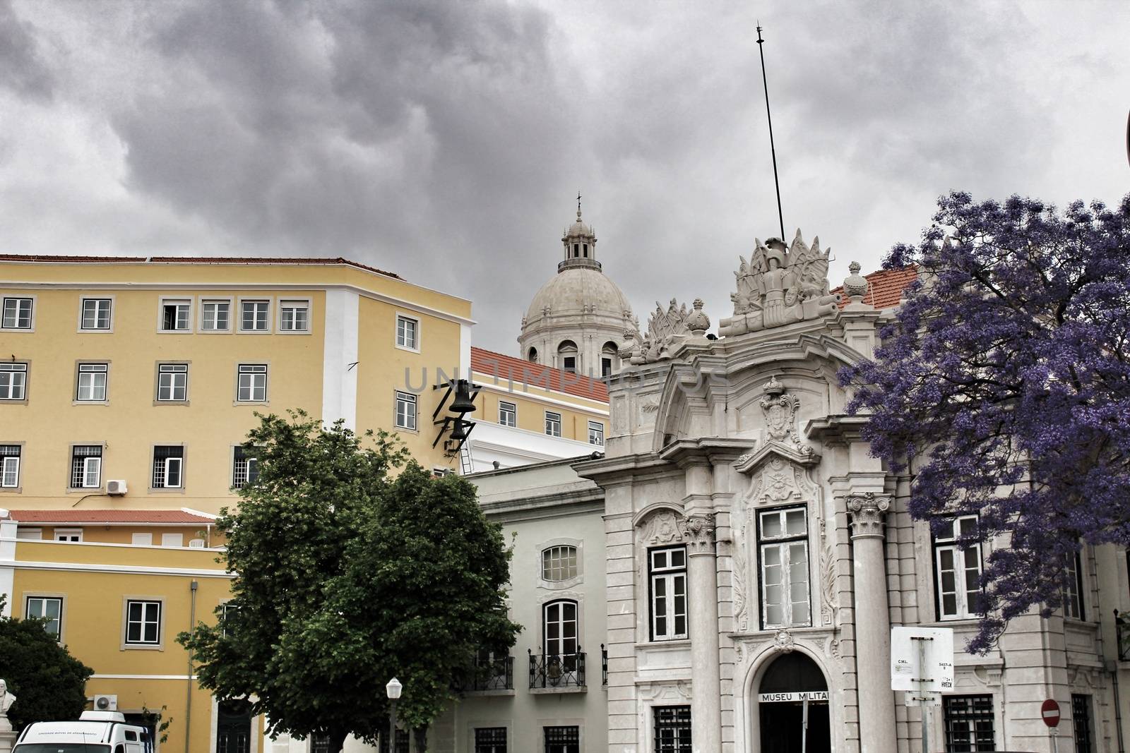 Majestic facades of Lisbon city and The National Pantheon in the background on a cloudy day of Spring