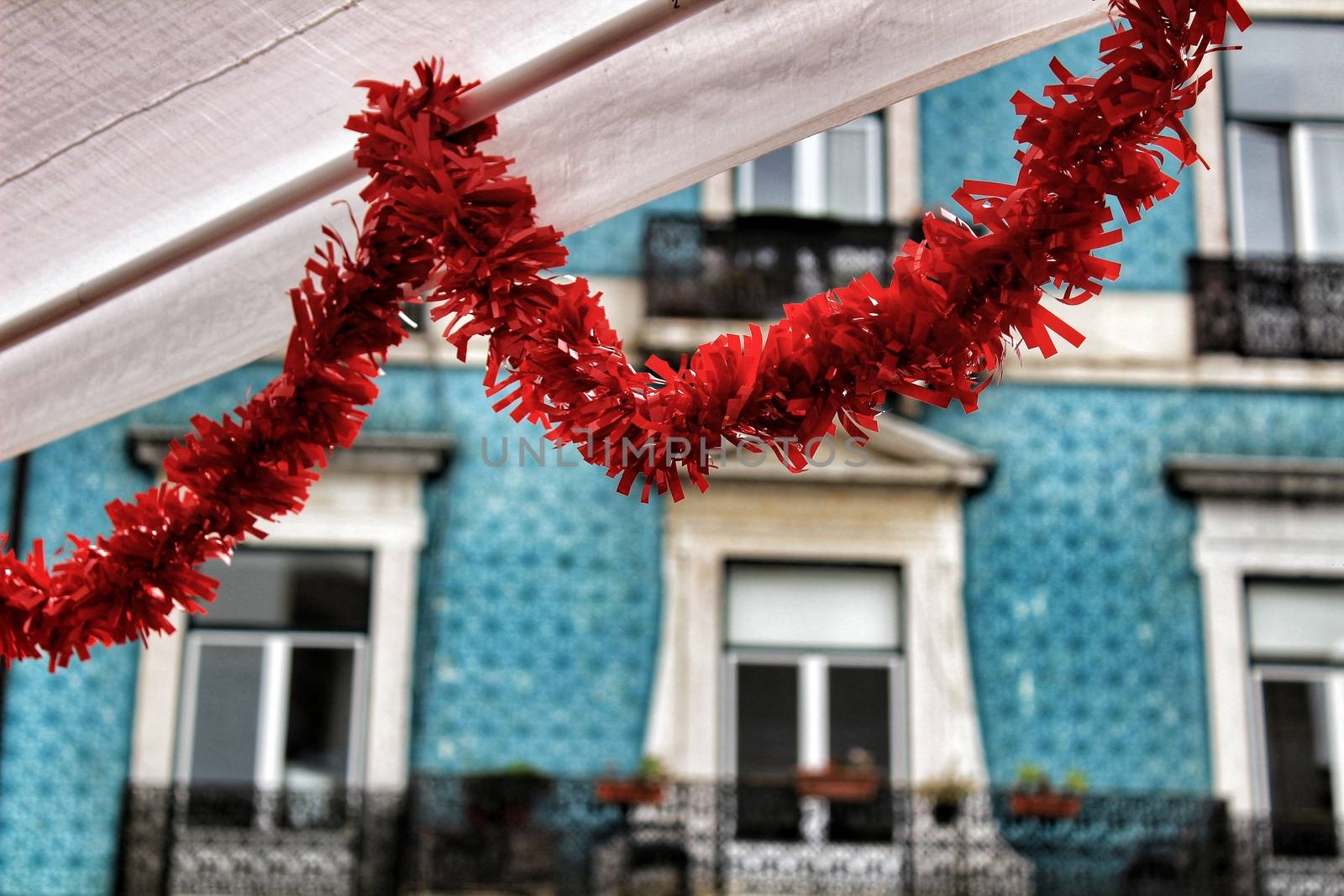 Streets adorned with garlands in Alfama, Lisbon by soniabonet