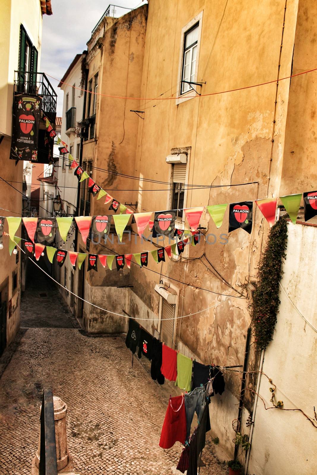 Lisbon, Portugal- June 8, 2018: Streets adorned with garlands for the festivities of Saint Anthony in the Alfama neighborhood in Lisbon