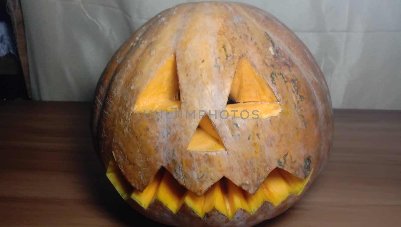 pumpkin face closeup with eye and mouth for halloween