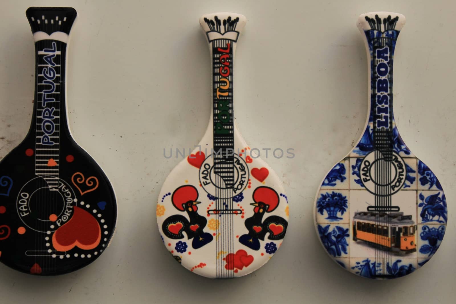 Fridge souvenir magnets imitating portuguese fado guitar by soniabonet