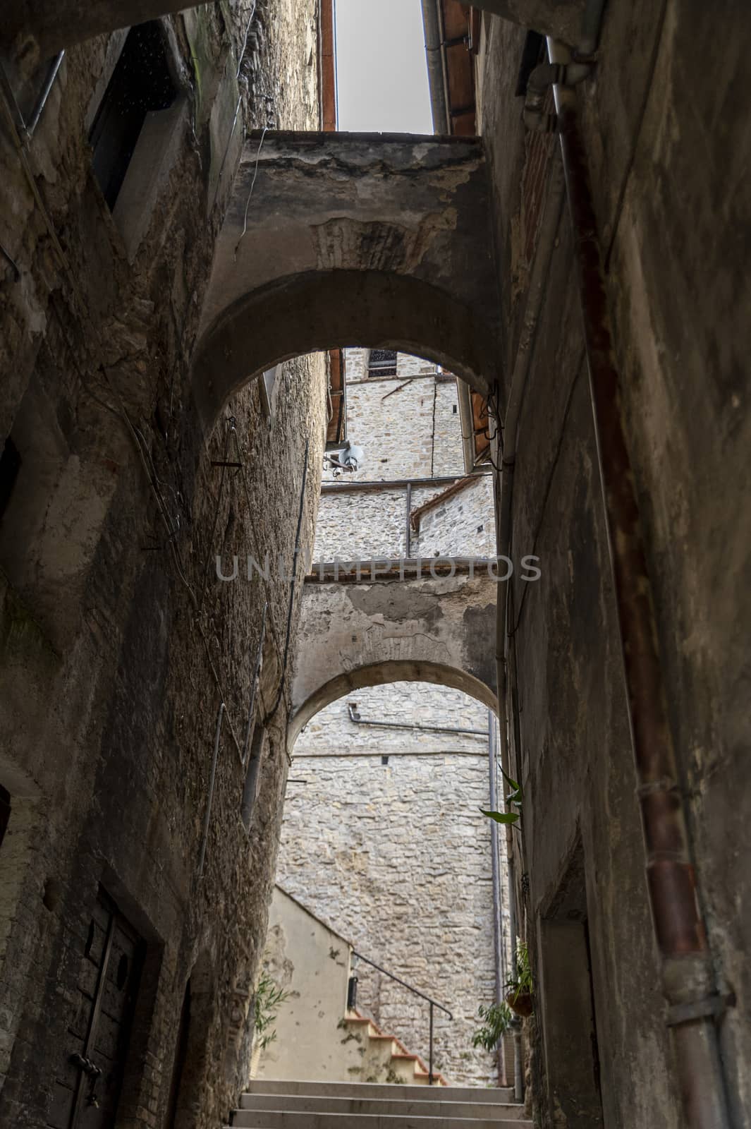 architecture of glimpses of the narrow streets of the town of Papigno by carfedeph