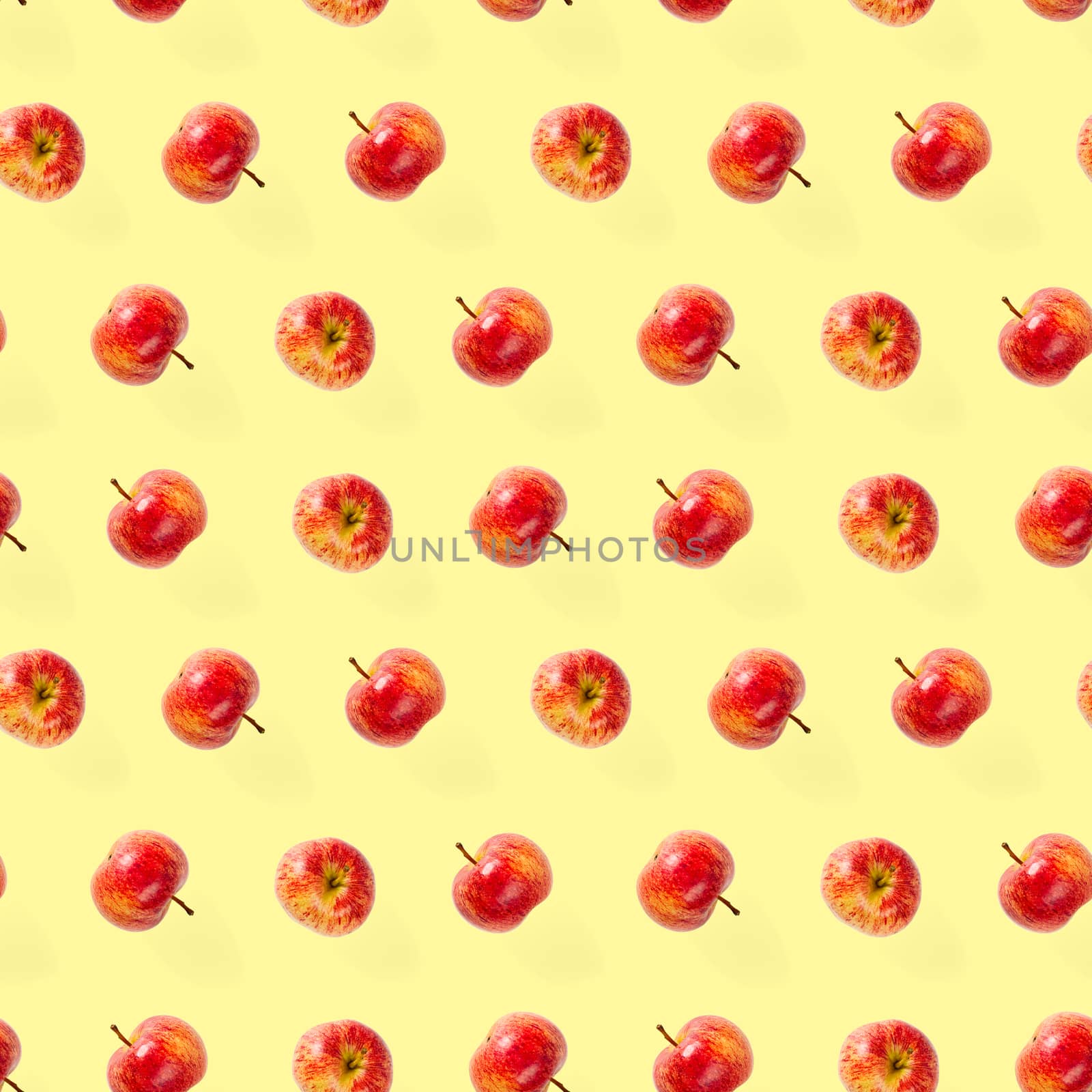 Seamless pattern with ripe apples. Apple seamless pattern on yellow background. Tropical fruit abstract background.