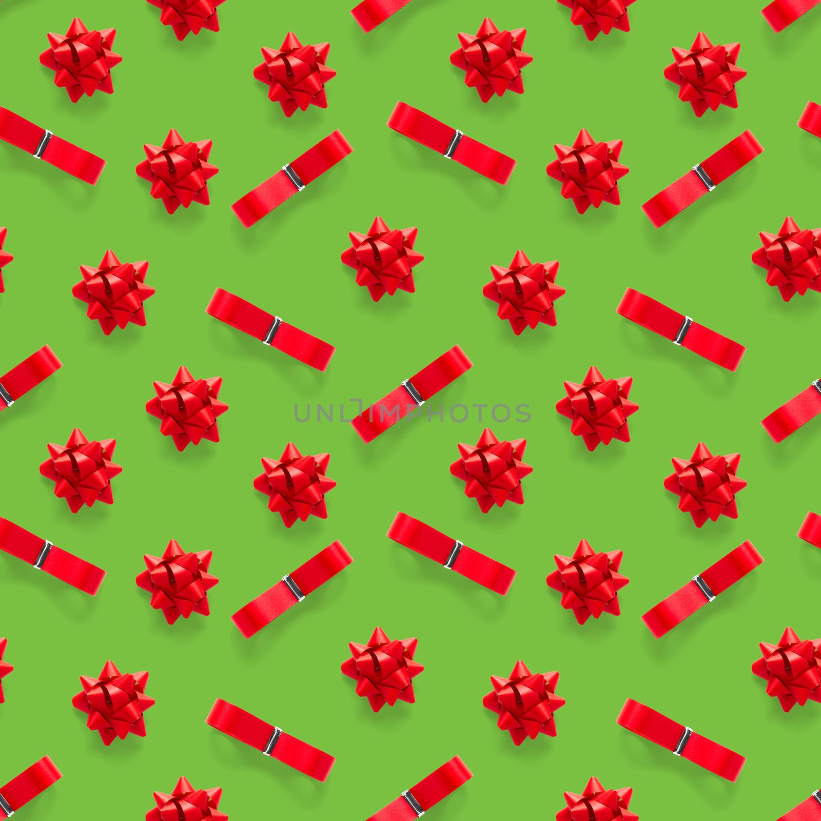 Seamless regular creative Christmas pattern with New Year decorations on green background. xmas Modern Seamless pattern made from christmas decorations. Photo quality pattern for fabric, prints, wallpapers, banners or creative design works.
