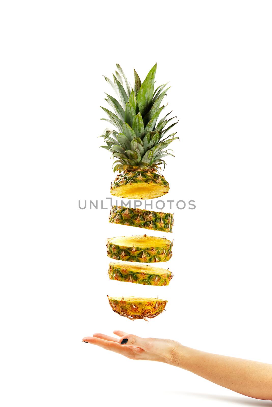 Pineapple fresh ananas. Pineapple sliced, levitates in the air. Tropical fruit. Concept of summer mood on white background, isolate.