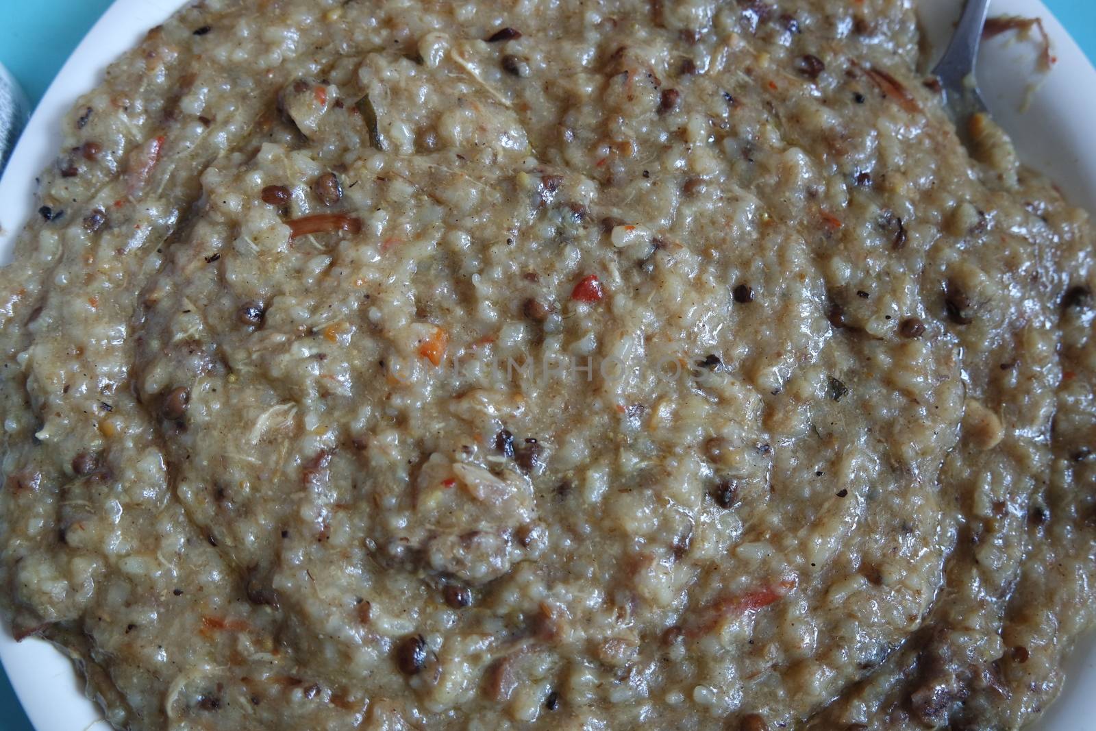 A close up view of Cooked white rice called Kichra served with green mint with traditional Charsadda recipe popular for its delicious taste in Pakistan