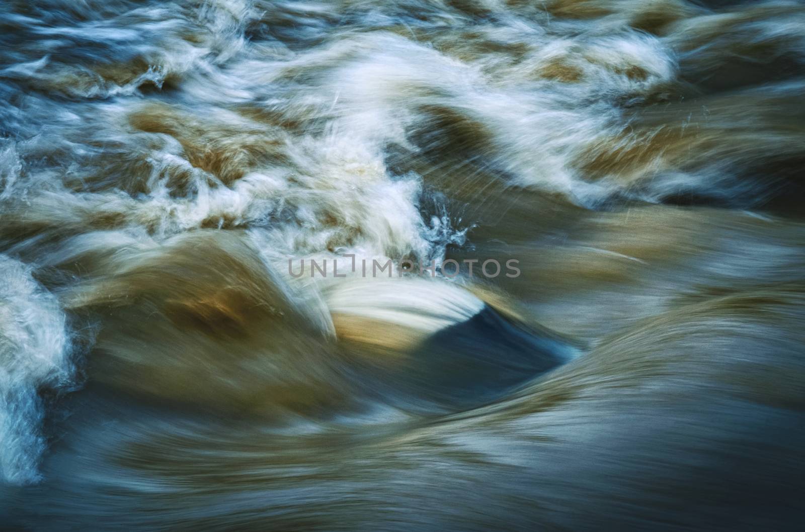 nature seasonal background wild river rapids after the rain