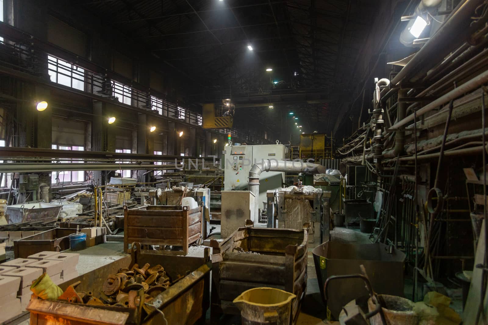 mess in the old foundry, dusty and dirty internals.
