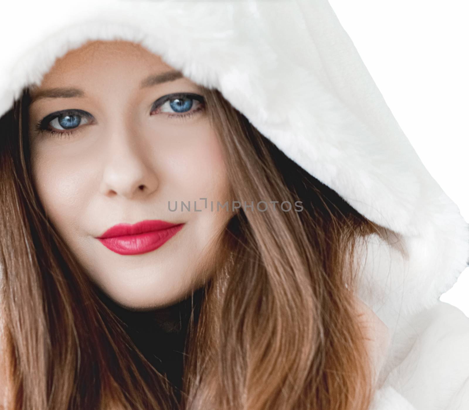 Young woman in fluffy fur coat with hood wrap, warm winter clothing for fashion and Christmas holidays design