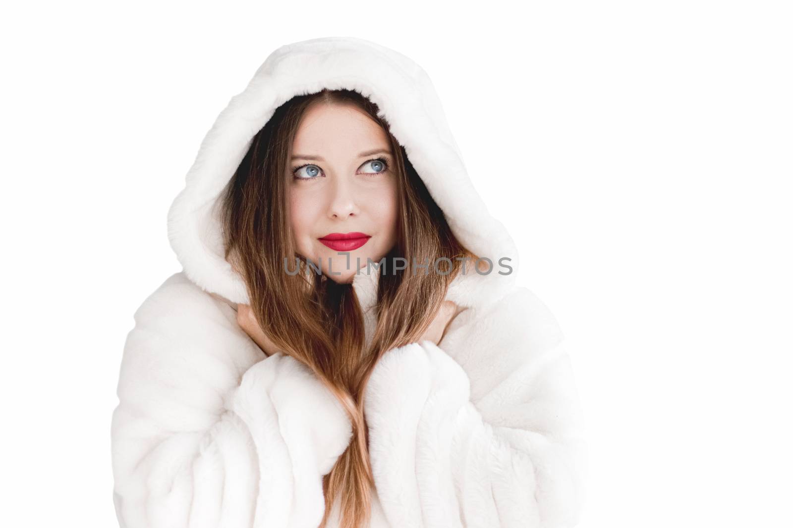 Young woman in fluffy fur coat with hood wrap, warm winter cloth by Anneleven