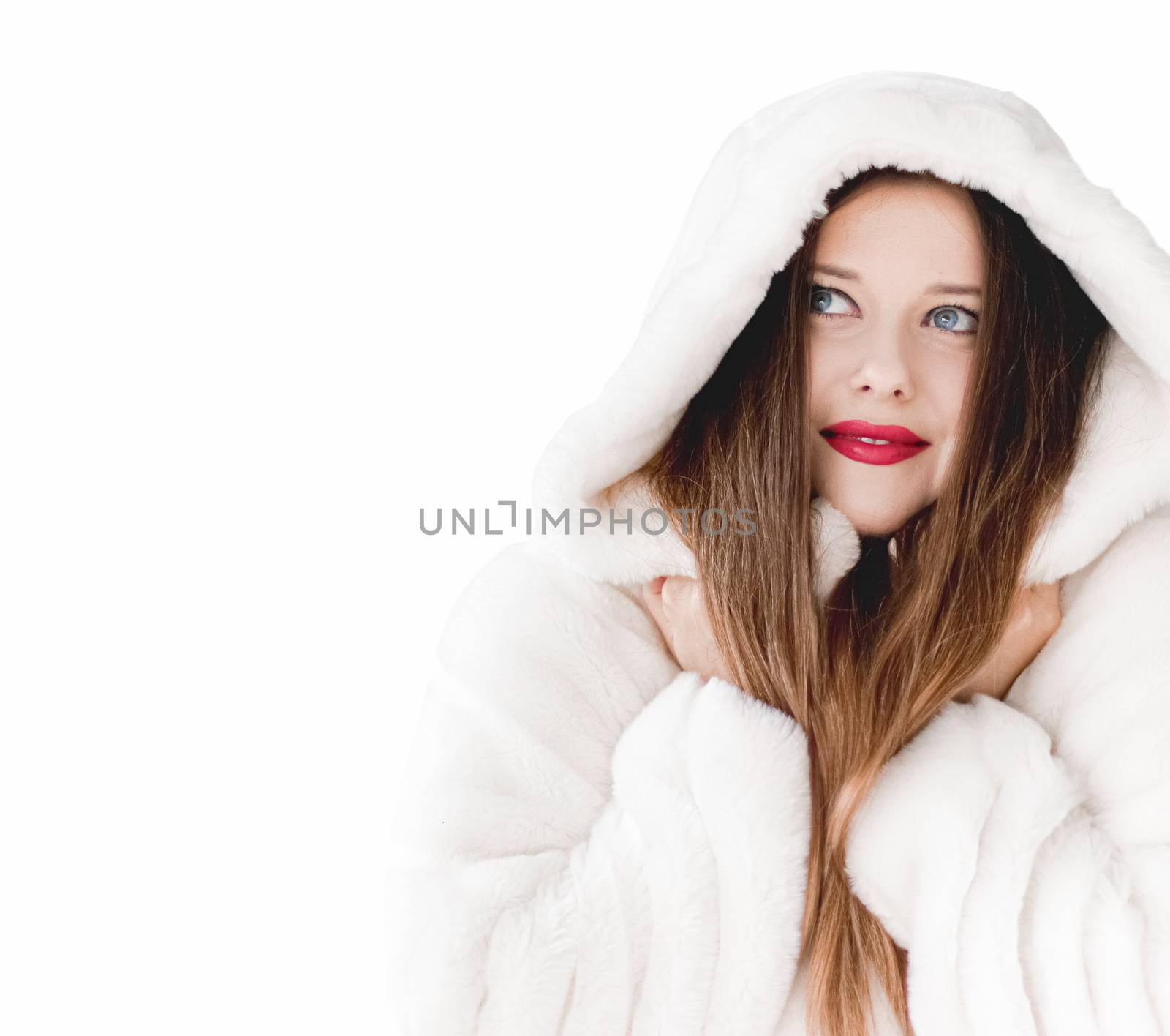 Young woman in fluffy fur coat with hood wrap, warm winter cloth by Anneleven