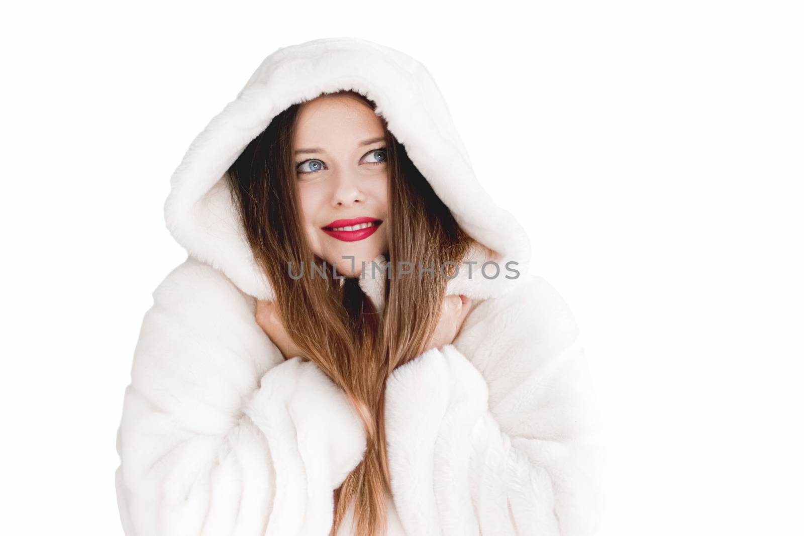 Young woman in fluffy fur coat with hood wrap, warm winter cloth by Anneleven