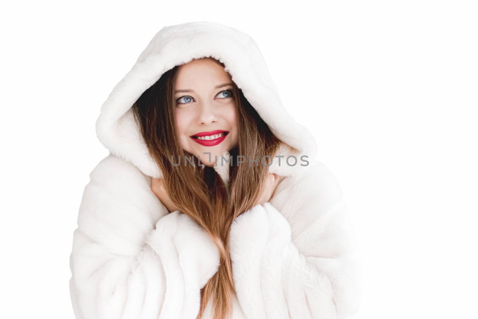 Young woman in fluffy fur coat with hood wrap, warm winter cloth by Anneleven