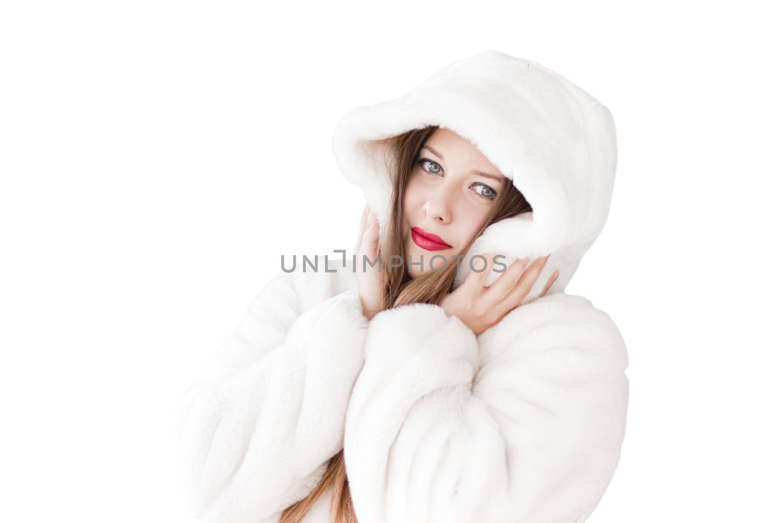 Young woman in fluffy fur coat with hood wrap, warm winter cloth by Anneleven