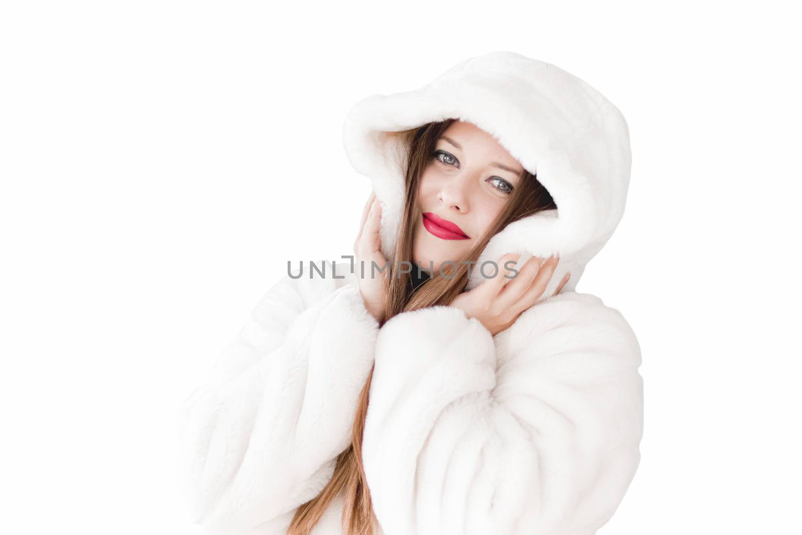 Young woman in fluffy fur coat with hood wrap, warm winter clothing for fashion and Christmas holidays design