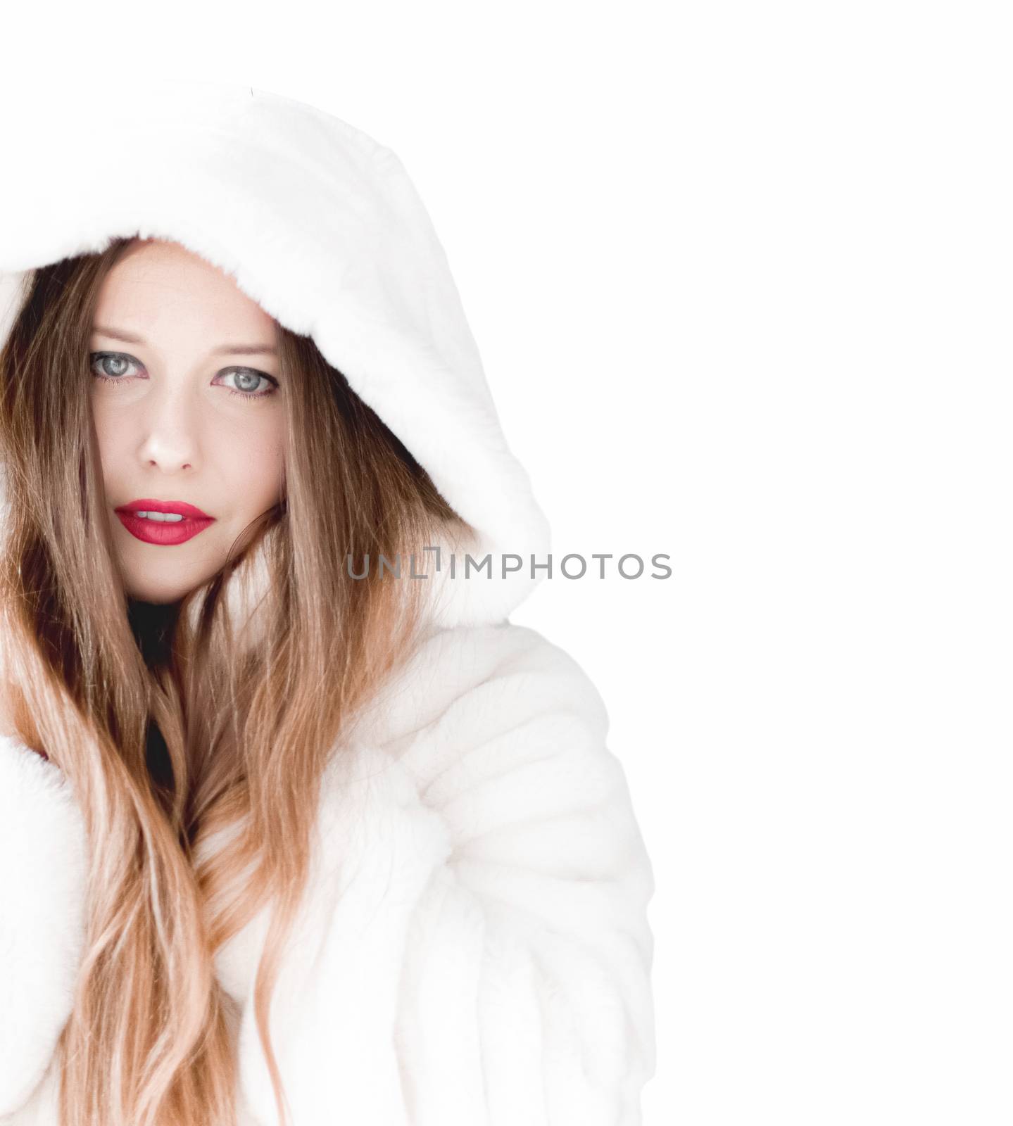 Young woman in fluffy fur coat with hood wrap, warm winter cloth by Anneleven