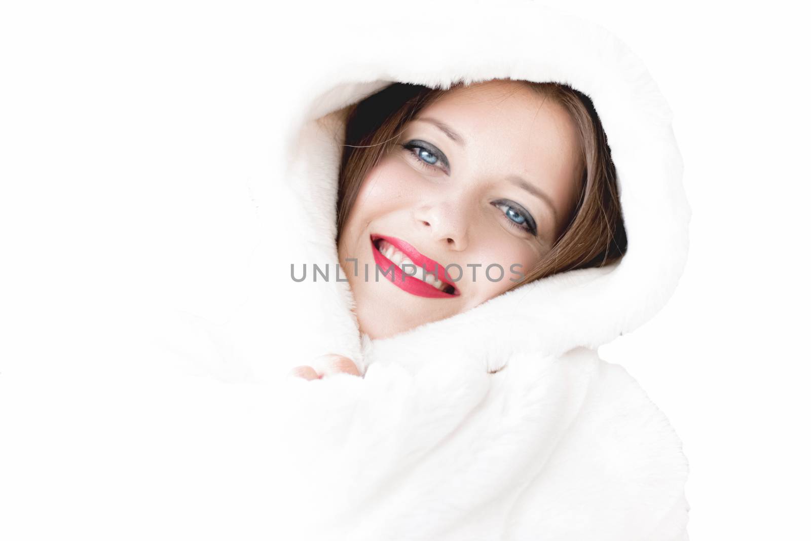 Young woman in fluffy fur coat with hood wrap, warm winter cloth by Anneleven