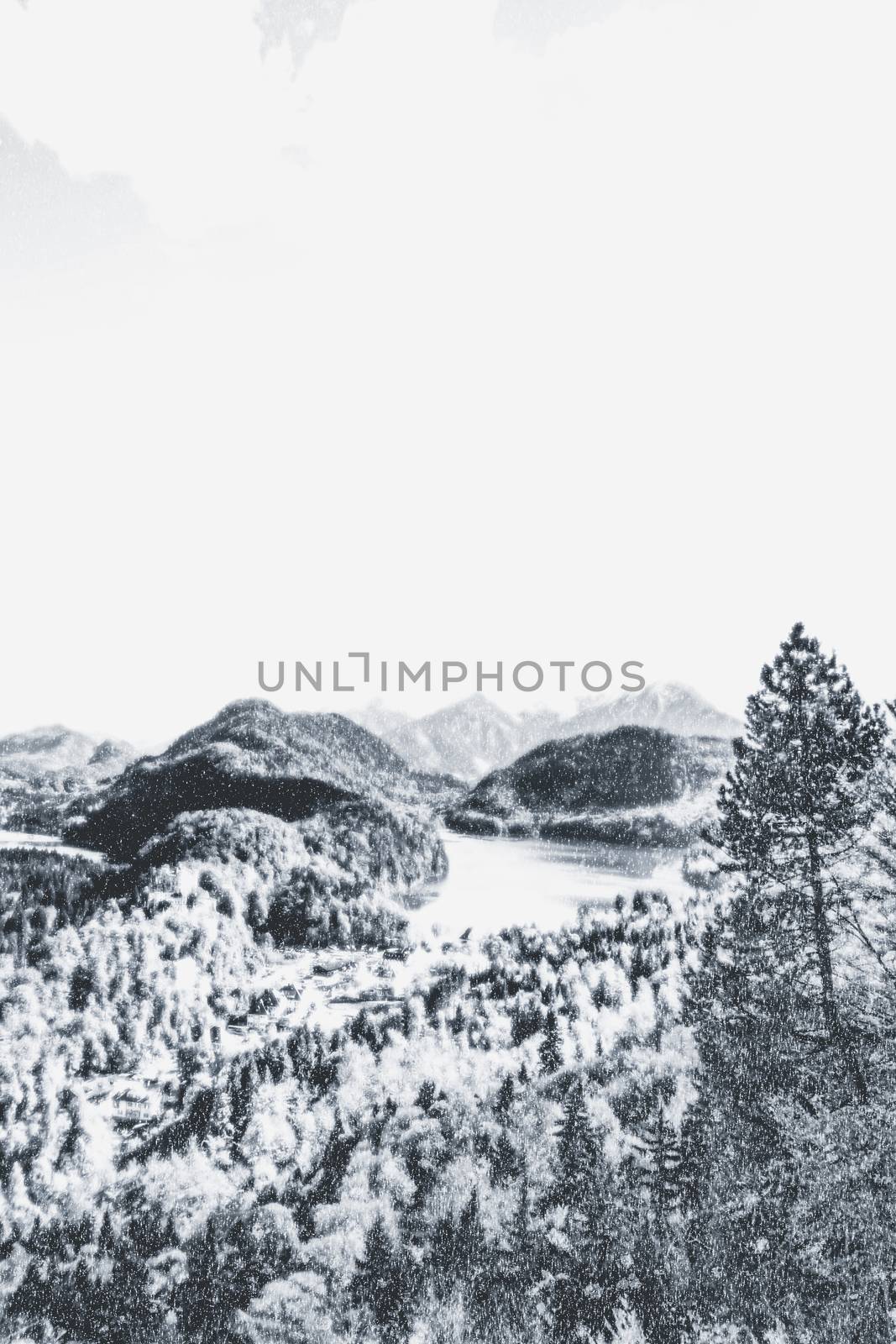 Christmas card with snowy mountains landscape in winter, monochrome photograph for art prints and printable designs