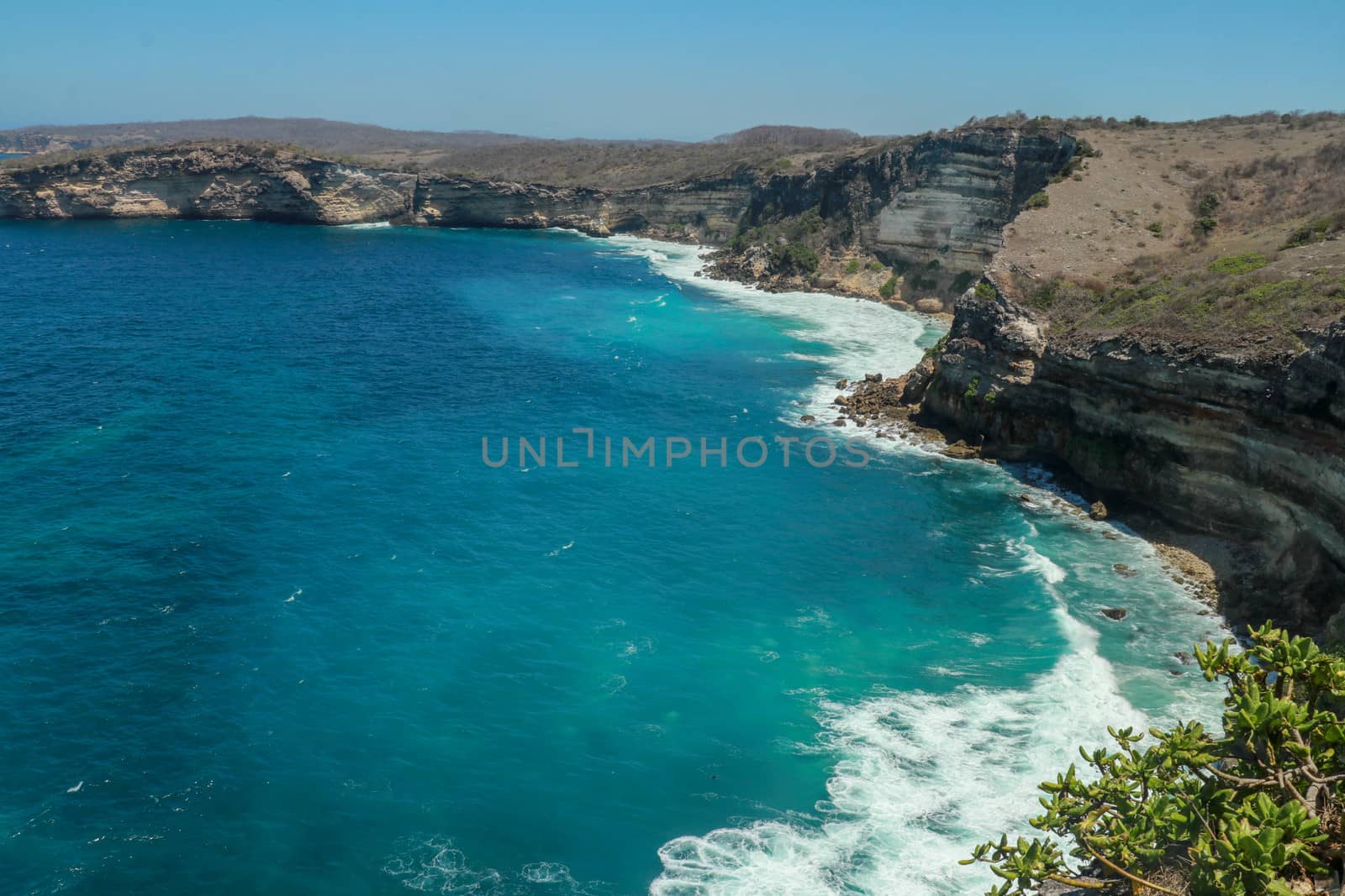 The cliff of Tanjung Ringgit, East Lombok. Panoramic view from the cliff. The hidden germ. High cliffs at the hidden place Tanjung Ringgit by Sanatana2008