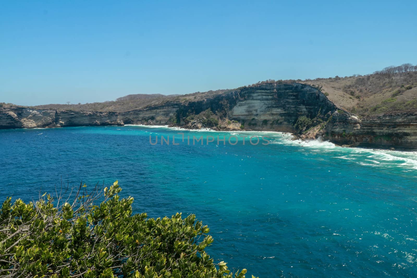 The cliff of Tanjung Ringgit, East Lombok. Panoramic view from the cliff. The hidden germ. High cliffs at the hidden place Tanjung Ringgit.