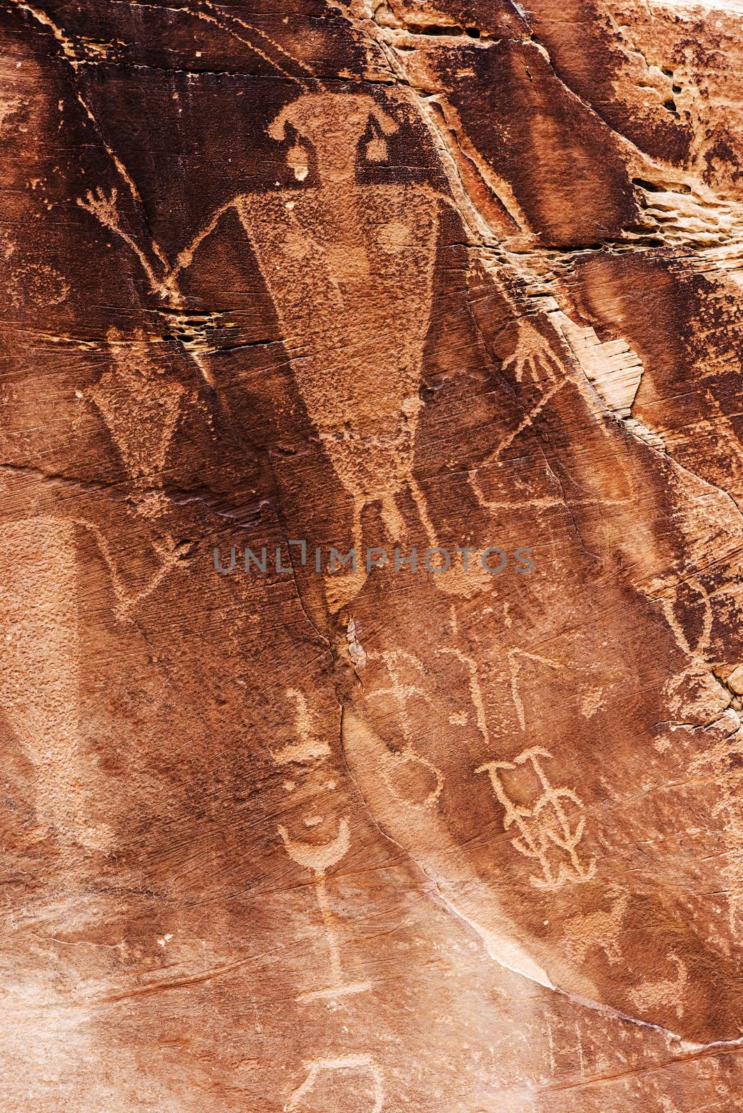 Man rock art (petroglyphs) by ancient Fremont people - native Americans - seen during hiking at Dinosaur National Monument in Utah, USA