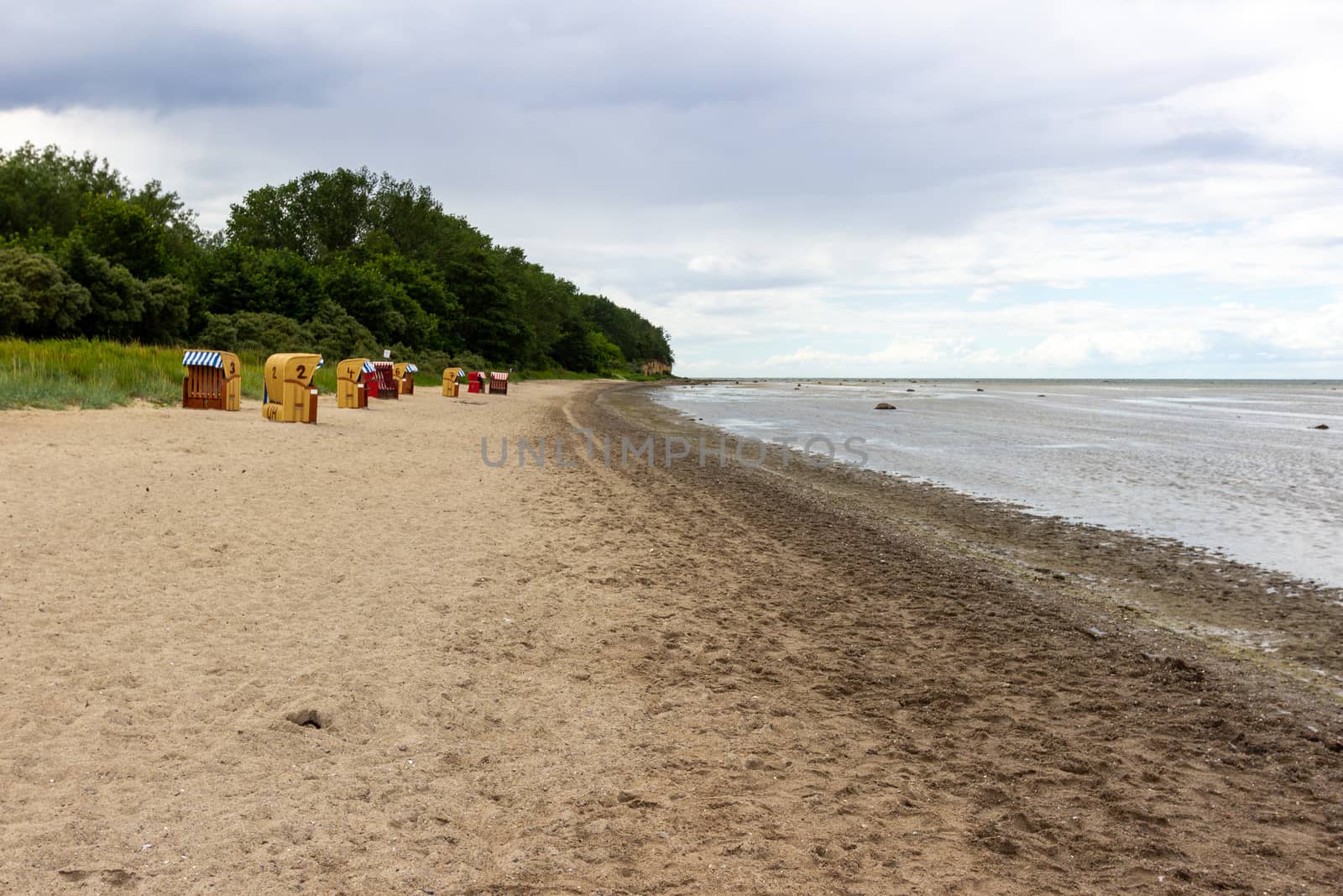 Scenic view at  beach on Poel island at the Baltic sea, Germany with beach chairs and say 