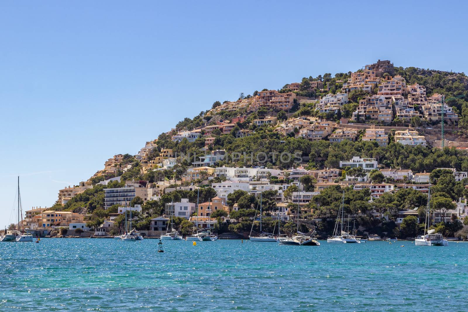 Port d' Andratx on the west cost of Mallorca with houses on a hill