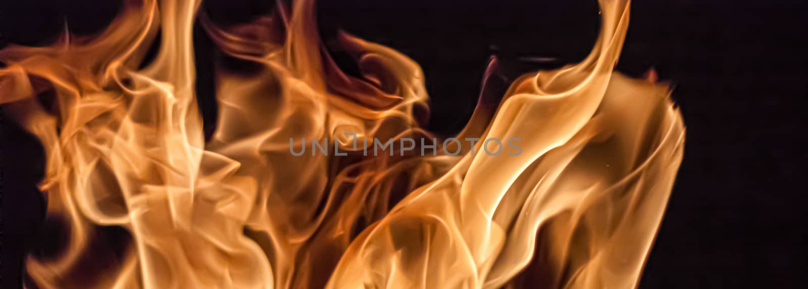 Fire flames as nature element and abstract background by Anneleven