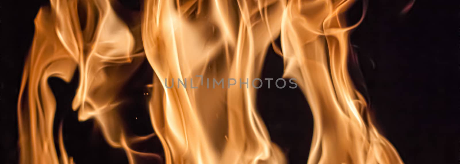 Fire flames as nature element and abstract background by Anneleven