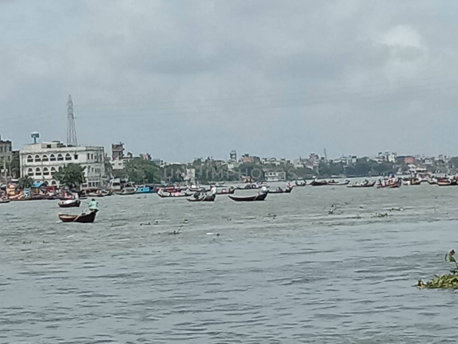 river and boat and sky view with city