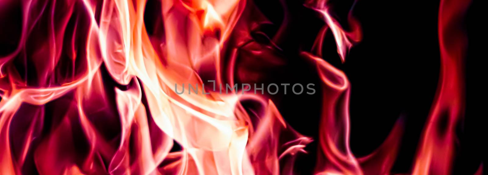 Red fire flames as nature element and abstract background by Anneleven
