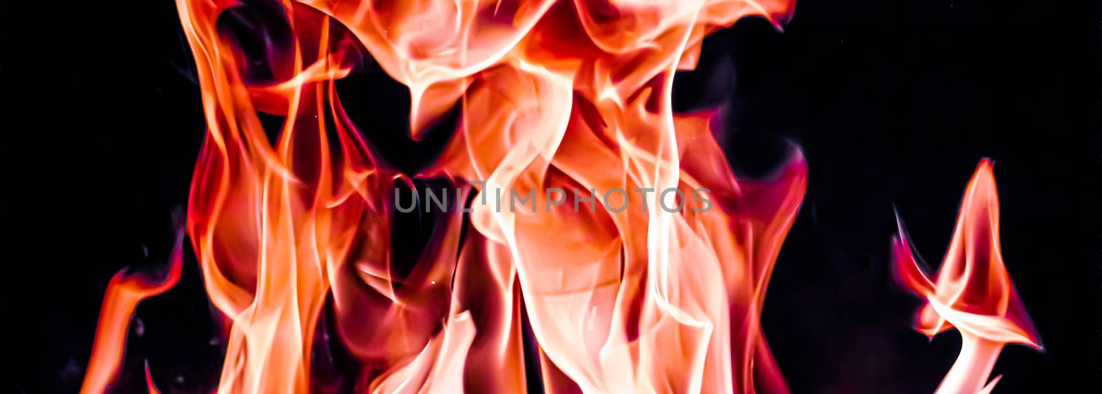 Red fire flames as nature element and abstract background by Anneleven