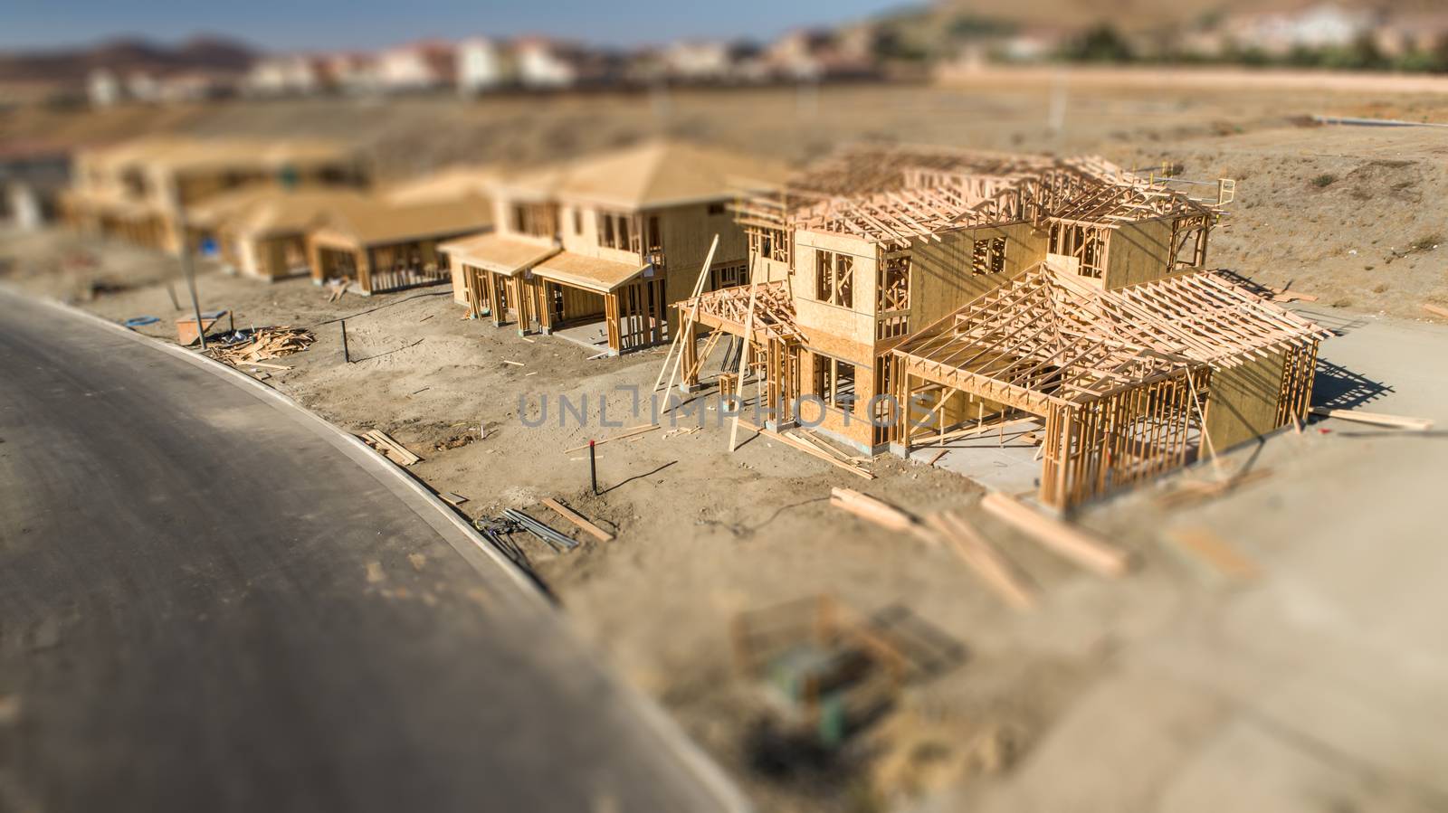 Aerial View of New Homes Construction Site with Tilt-Shift Blur by Feverpitched