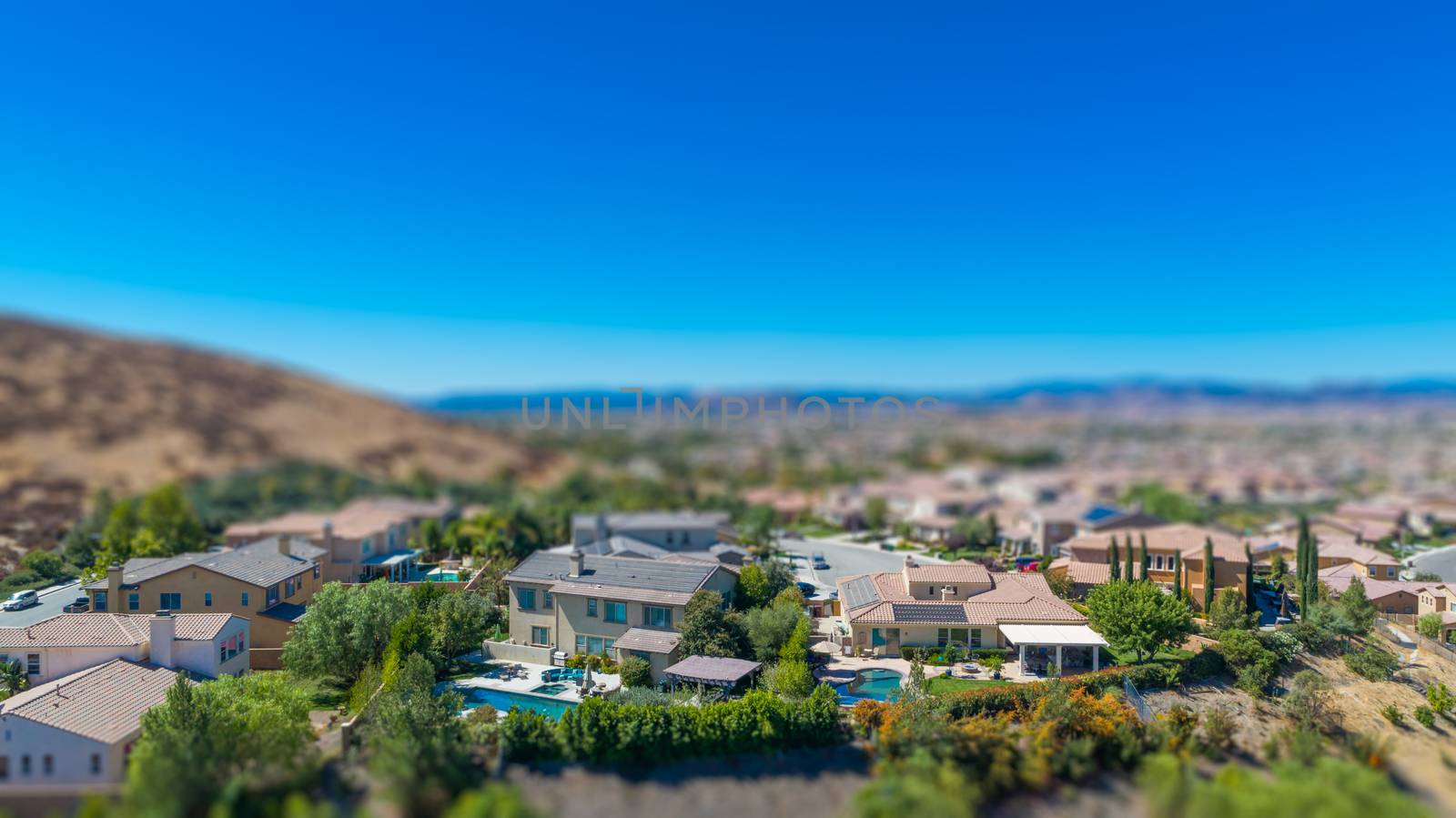 Aerial View of Populated Neigborhood Of Houses With Tilt-Shift Blur.